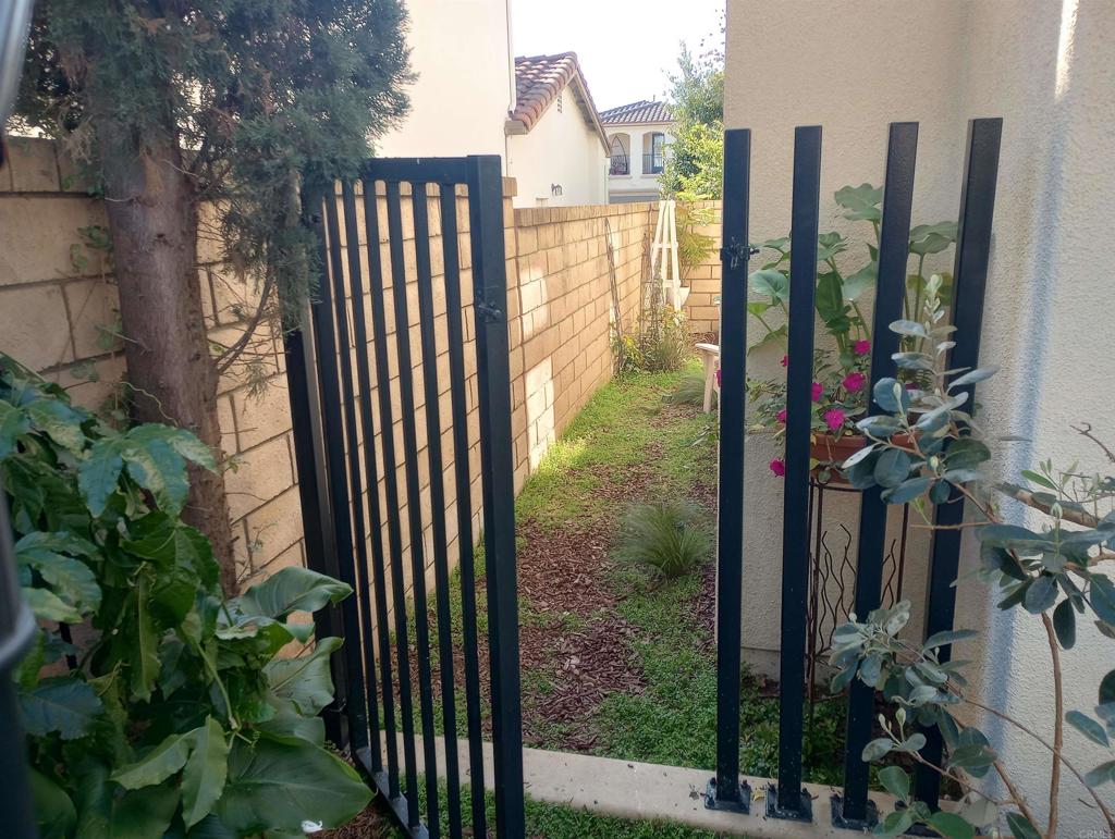 5544 Mill Creek Road San Diego, CA 92130 - Photo 17 of 54 a view of a potted plants next to a yard