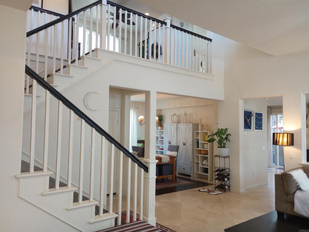 5544 Mill Creek Road San Diego, CA 92130 - Photo 2 of 54 a view of entryway with livingroom and furniture