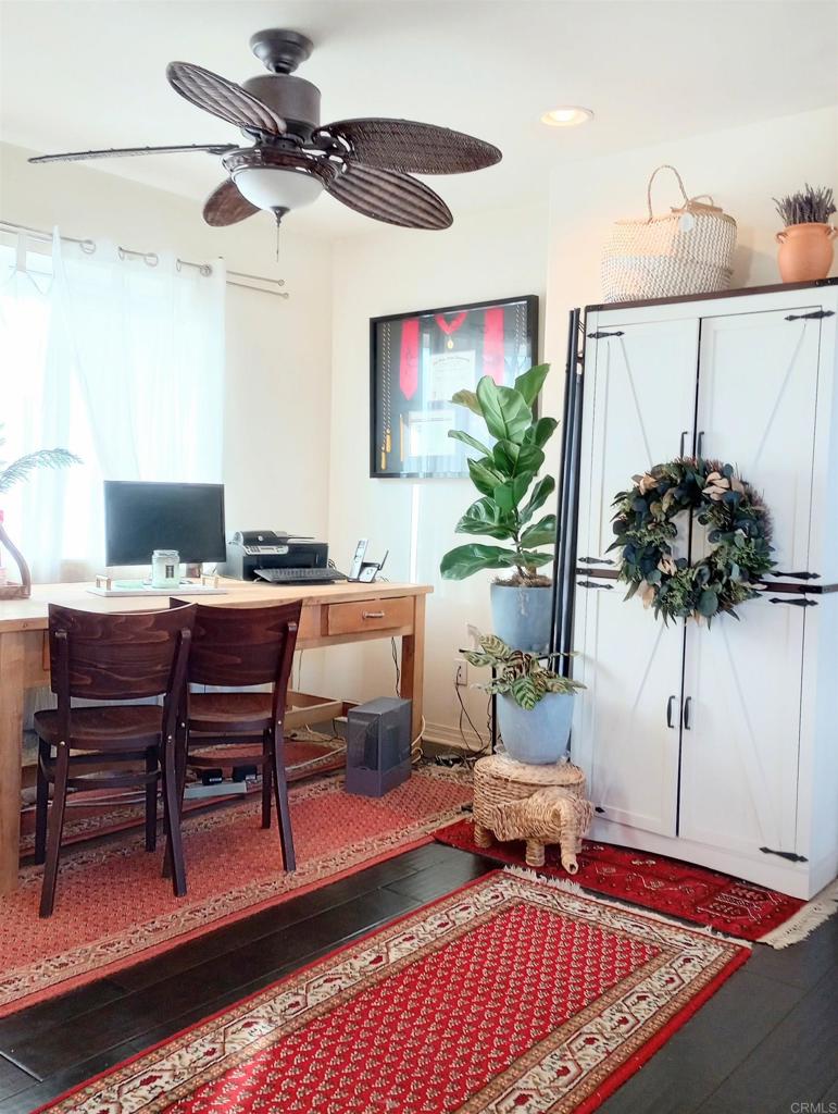 5544 Mill Creek Road San Diego, CA 92130 - Photo 32 of 54 a living room with furniture and a potted plant