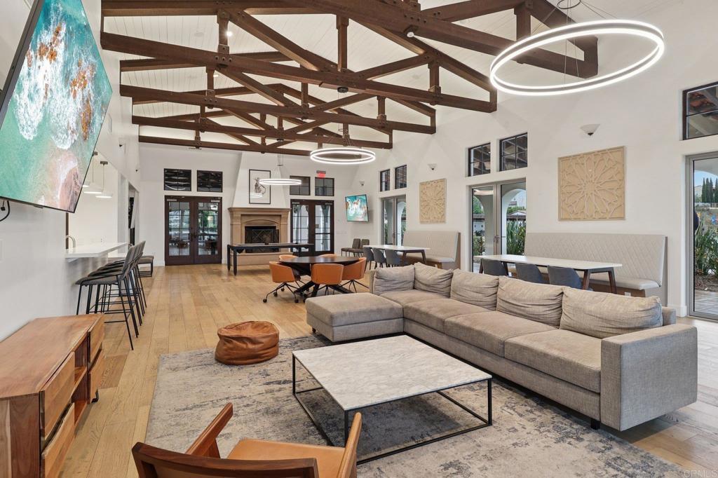 5544 Mill Creek Road San Diego, CA 92130 - Photo 47 of 54 a living room with furniture and a chandelier