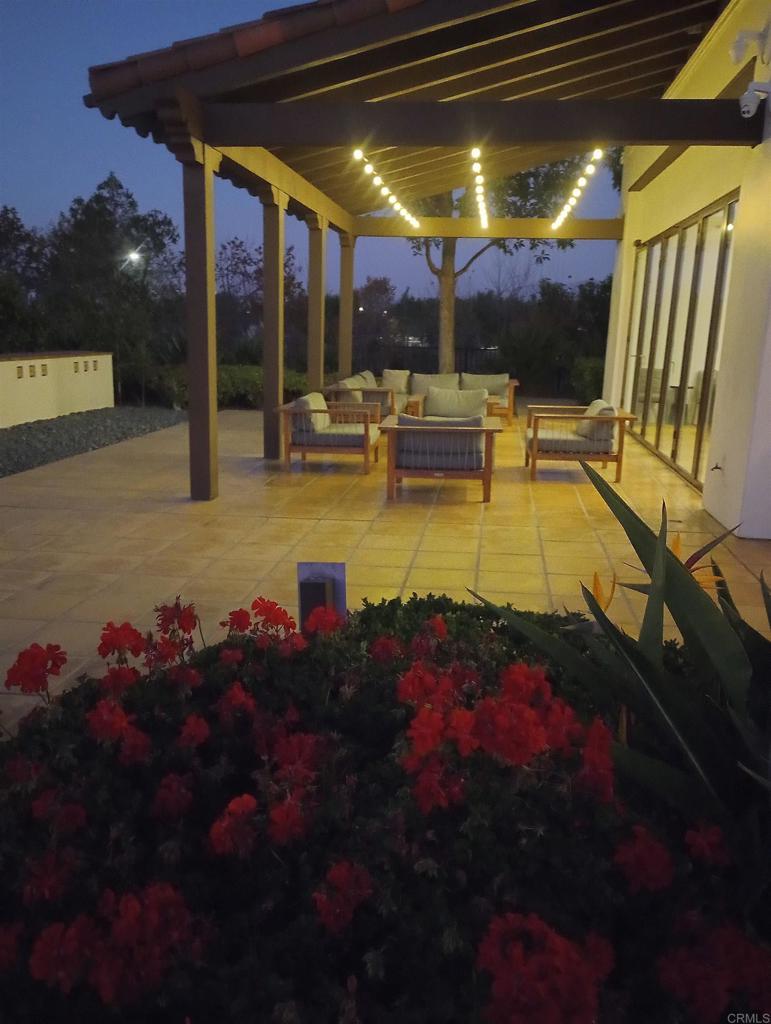 5544 Mill Creek Road San Diego, CA 92130 - Photo 50 of 54 a view of a swimming pool with an outdoor seating space