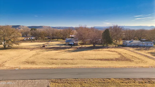 a view of ocean and a mountain