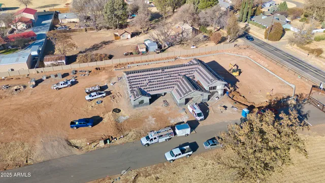 a kitchen with stainless steel appliances granite countertop a stove and a microwave