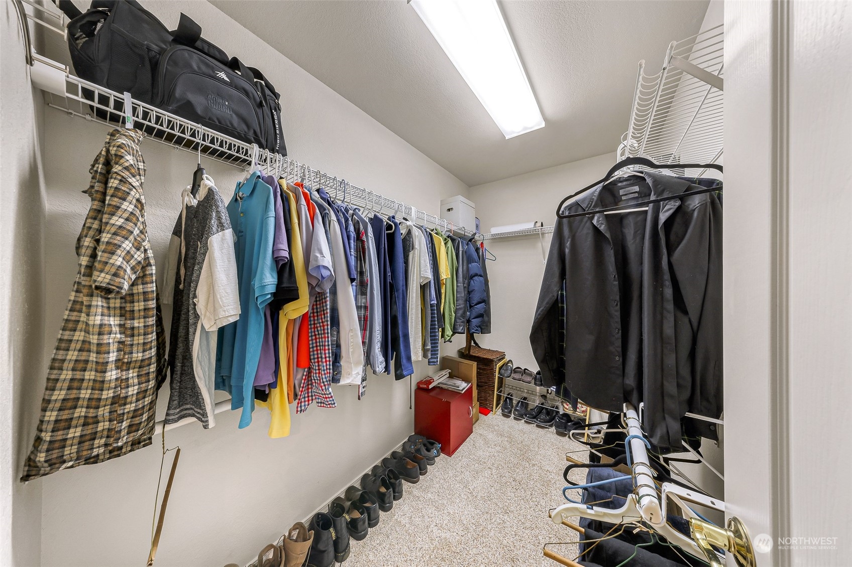 3827 Copper Pond Anacortes, WA 98221 - Photo 14 of 26 a view of walk in closet with clothes