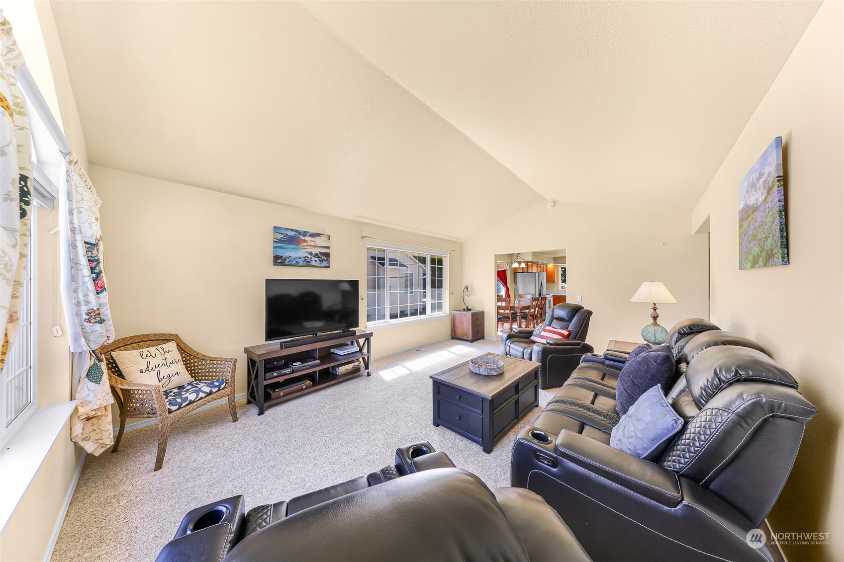3827 Copper Pond Anacortes, WA 98221 - Photo 2 of 26 a living room with furniture and a flat screen tv