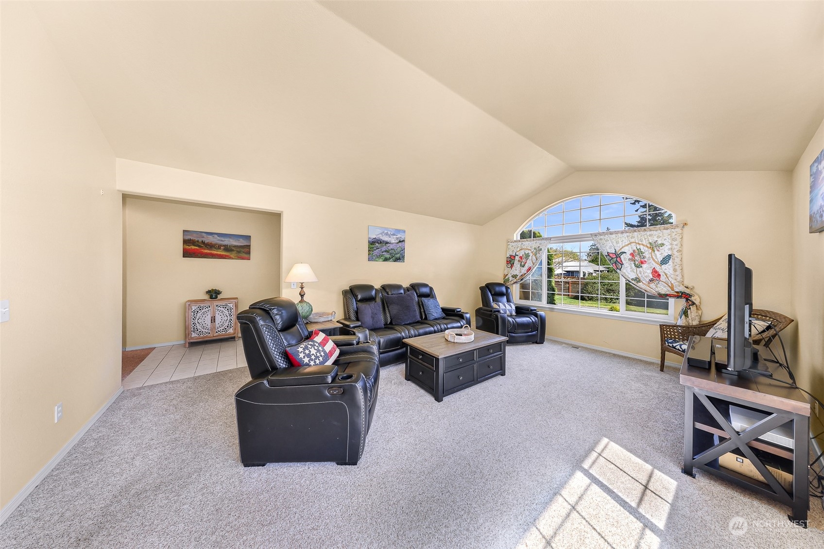 3827 Copper Pond Anacortes, WA 98221 - Photo 3 of 26 a living room with furniture and a flat screen tv
