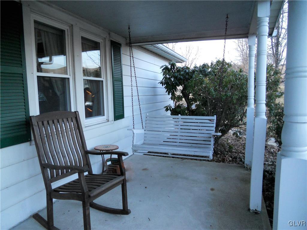 4297 Pleasant Road Bangor, PA 18013 - Photo 5 of 46 The front porch swing is a great place to relax