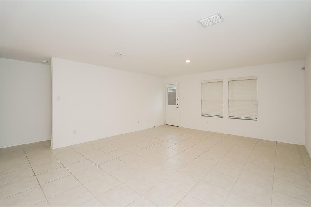 14841 Firerock Road Haslet, TX 76052 - Photo 2 of 18 a view of an empty room