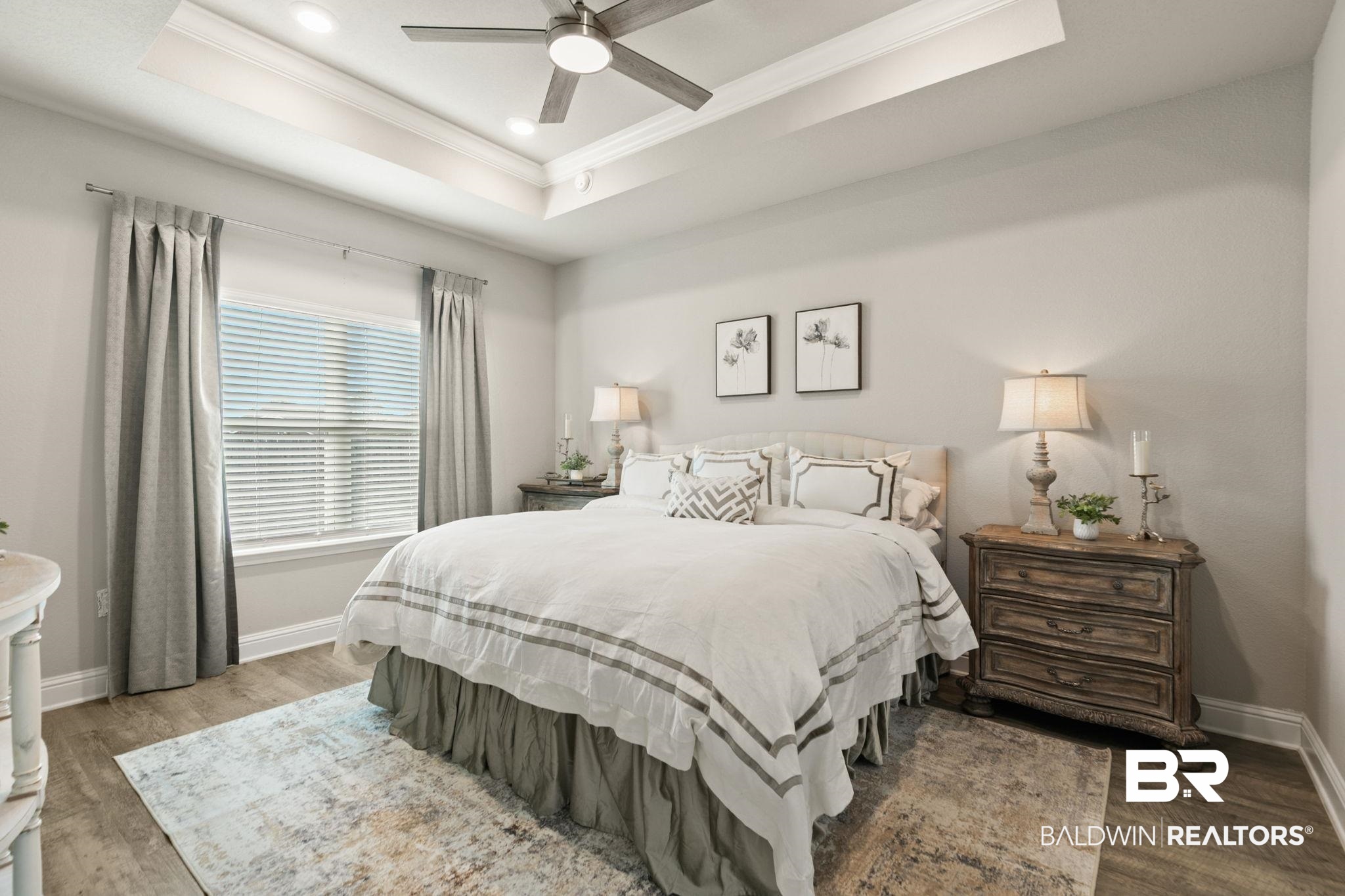 31650 Memphis Loop Daphne, AL 36527 - Photo 21 of 68 Bedroom featuring ornamental molding, wood finished floors, ceiling fan, a raised ceiling, and recessed lighting