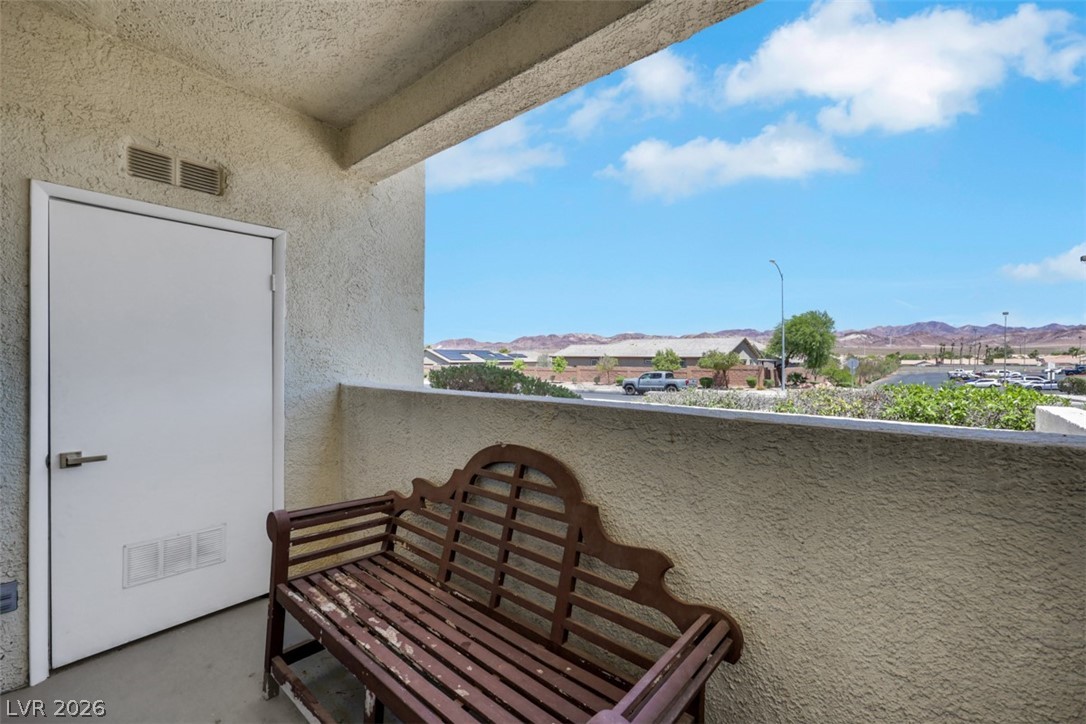 698 South Racetrack Road, Unit 1614 Henderson, NV 89015 - Photo 16 of 35 Enjoy scenic mountain views from this inviting balcony.