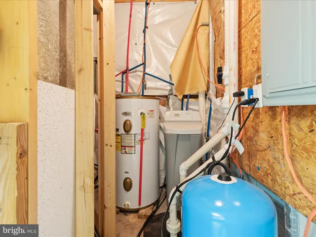 a swimming pool with trees in the background