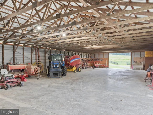 a picture of a bench in front of a wall