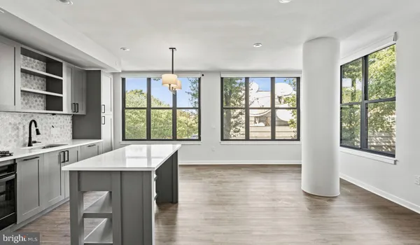 a view of a livingroom with wooden floor