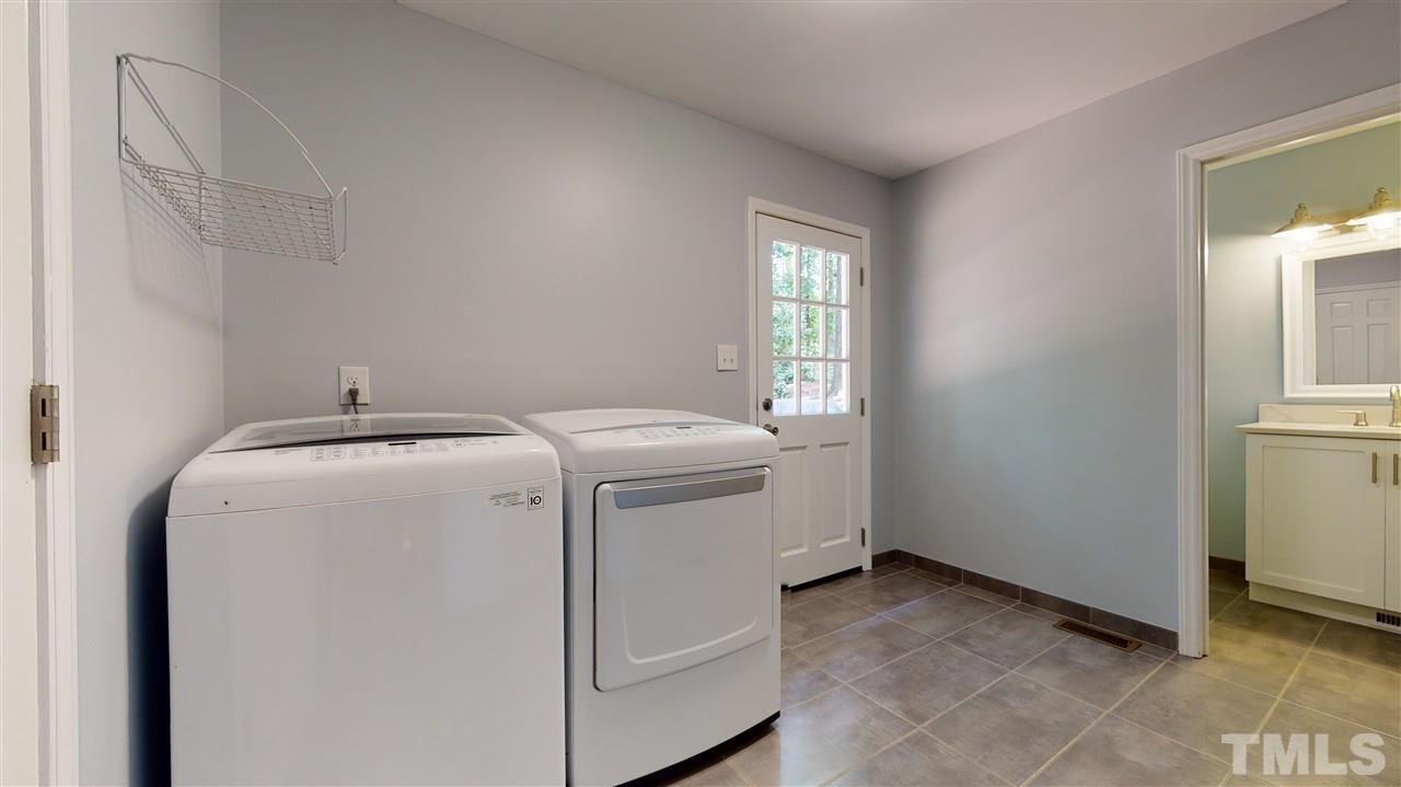 2104 Chrisdale Court Raleigh, NC 27607 - Photo 11 of 29 a utility room with dryer and washer