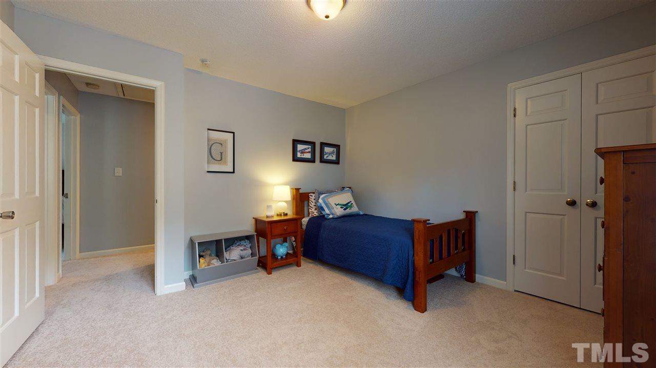 2104 Chrisdale Court Raleigh, NC 27607 - Photo 21 of 29 a living room with furniture