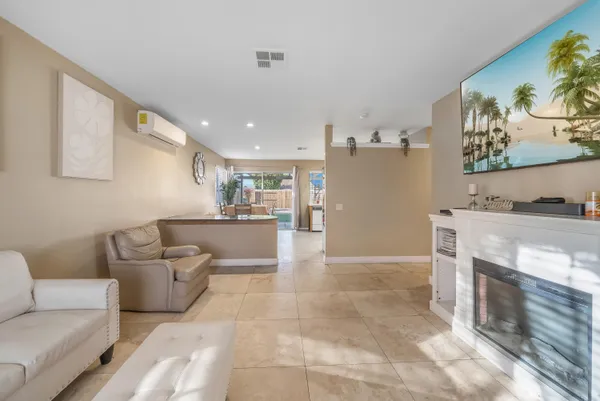 a view of a bathroom with a sink and a mirror