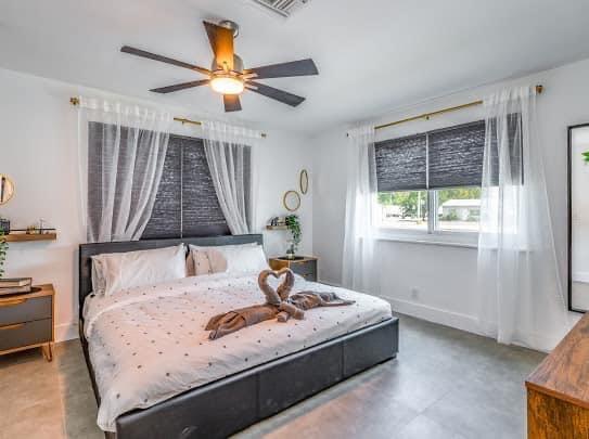 2747 Griffin Road, Unit 13 Fort Lauderdale, FL 33312 - Photo 11 of 37 a bedroom with a bed and a window