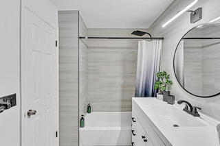 2747 Griffin Road, Unit 13 Fort Lauderdale, FL 33312 - Photo 26 of 37 a bathroom with a sink and a mirror