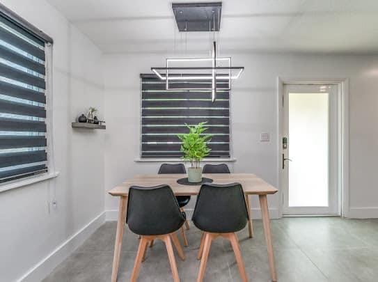 2747 Griffin Road, Unit 13 Fort Lauderdale, FL 33312 - Photo 6 of 37 a view of a dining room with furniture and window