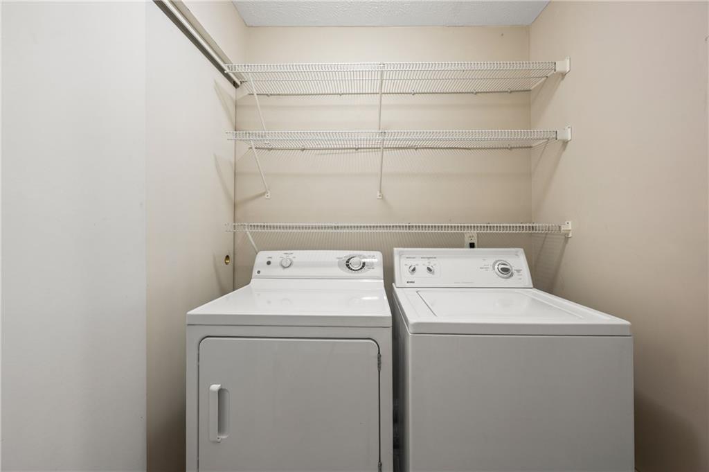 707 Gettysburg Place Atlanta, GA 30350 - Photo 27 of 40 a utility room with dryer and washer