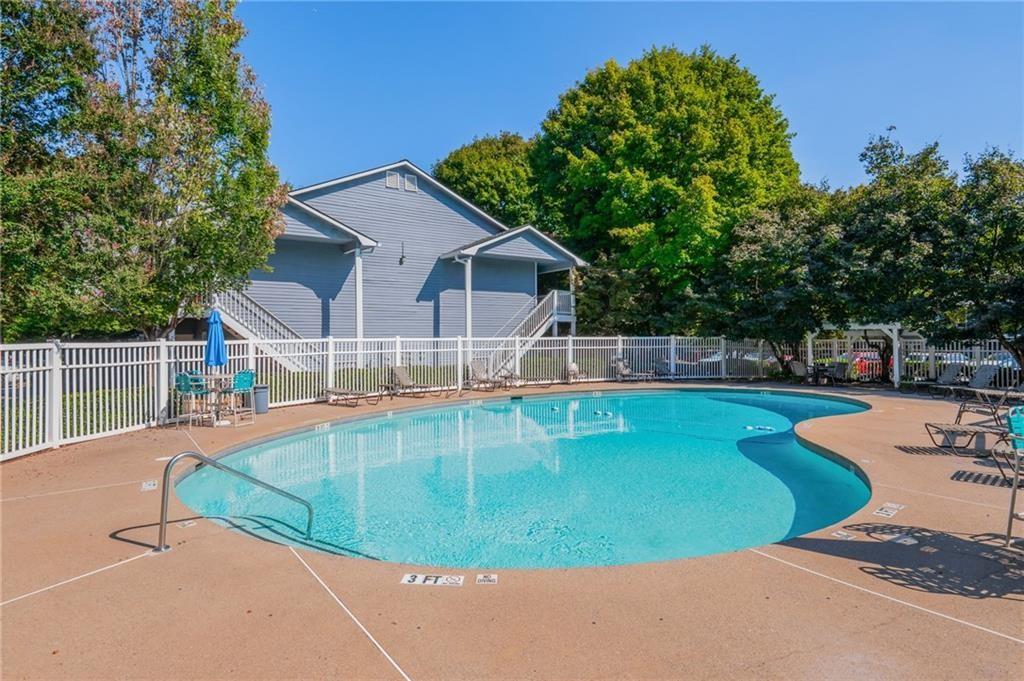 707 Gettysburg Place Atlanta, GA 30350 - Photo 31 of 40 a view of a house with swimming pool