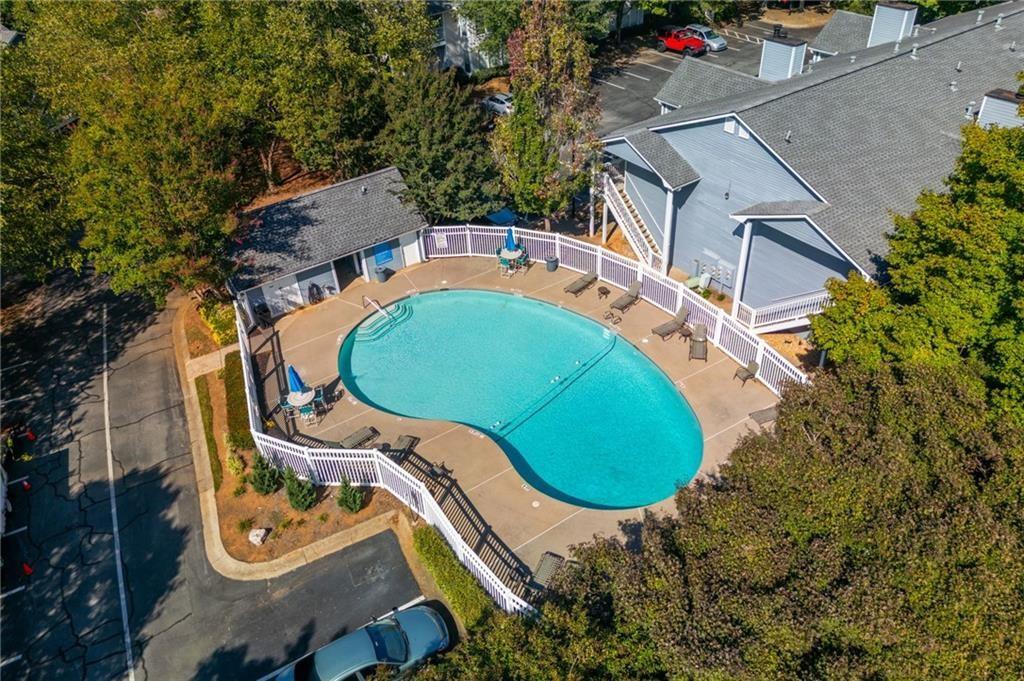 707 Gettysburg Place Atlanta, GA 30350 - Photo 32 of 40 an aerial view of a house with swimming pool and trees
