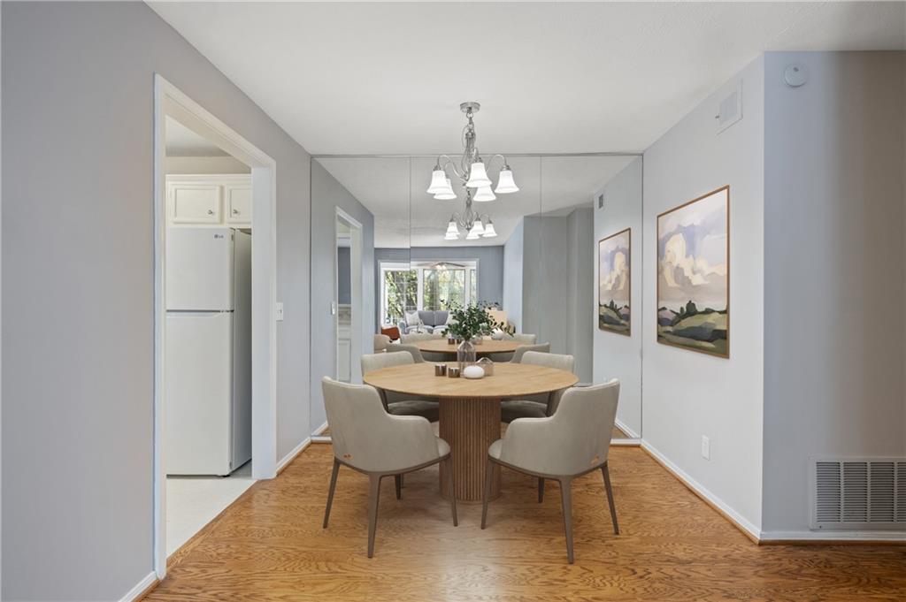707 Gettysburg Place Atlanta, GA 30350 - Photo 8 of 40 a dining room with furniture and window