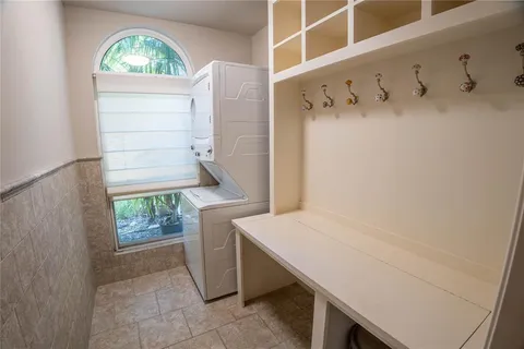 a bathroom with a sink and a window