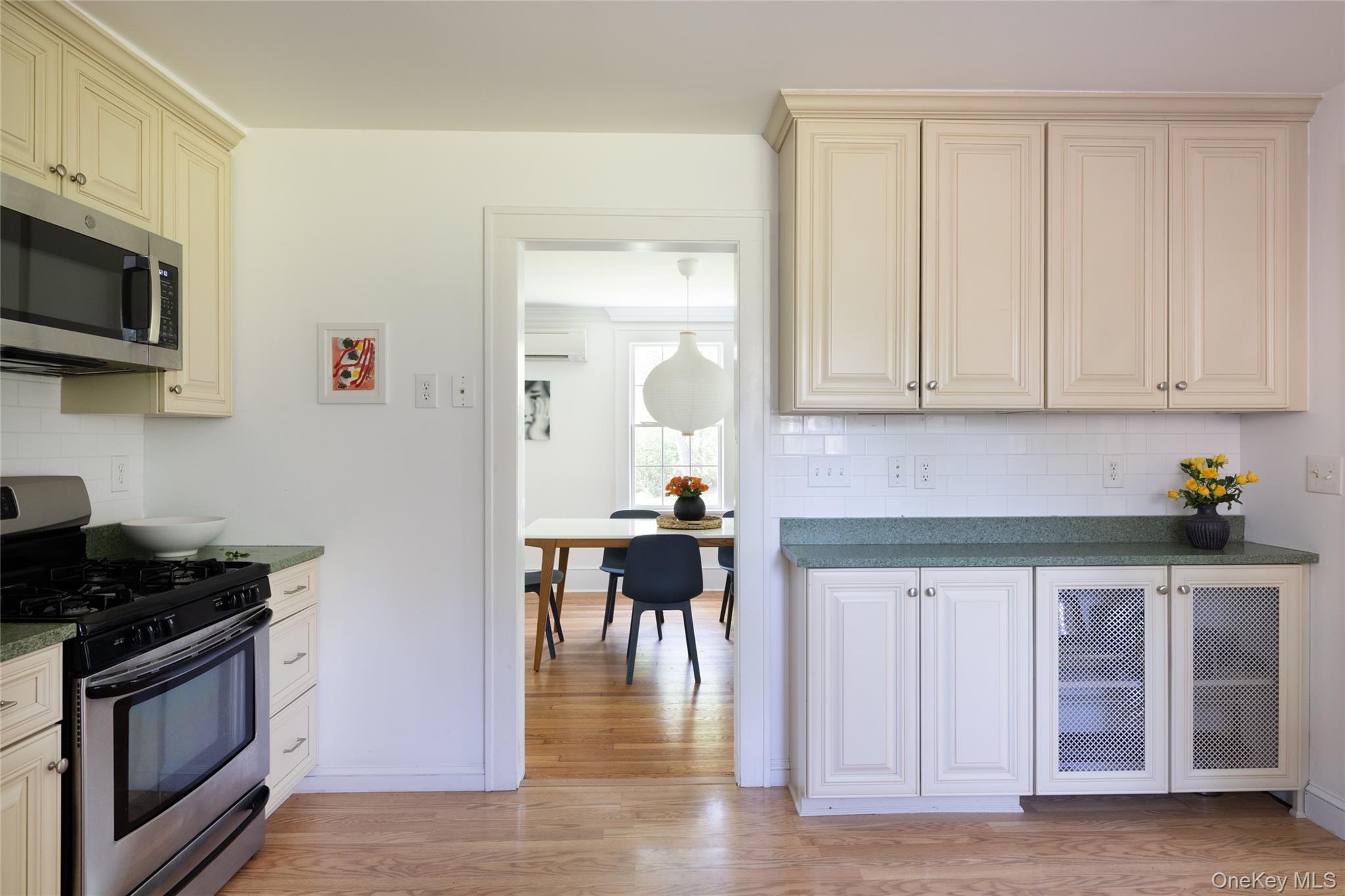 185 Verbank Village Road Millbrook, NY 12545 - Photo 7 of 22 a kitchen with a stove and a microwave