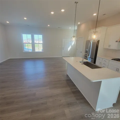 a view of a kitchen with a sink