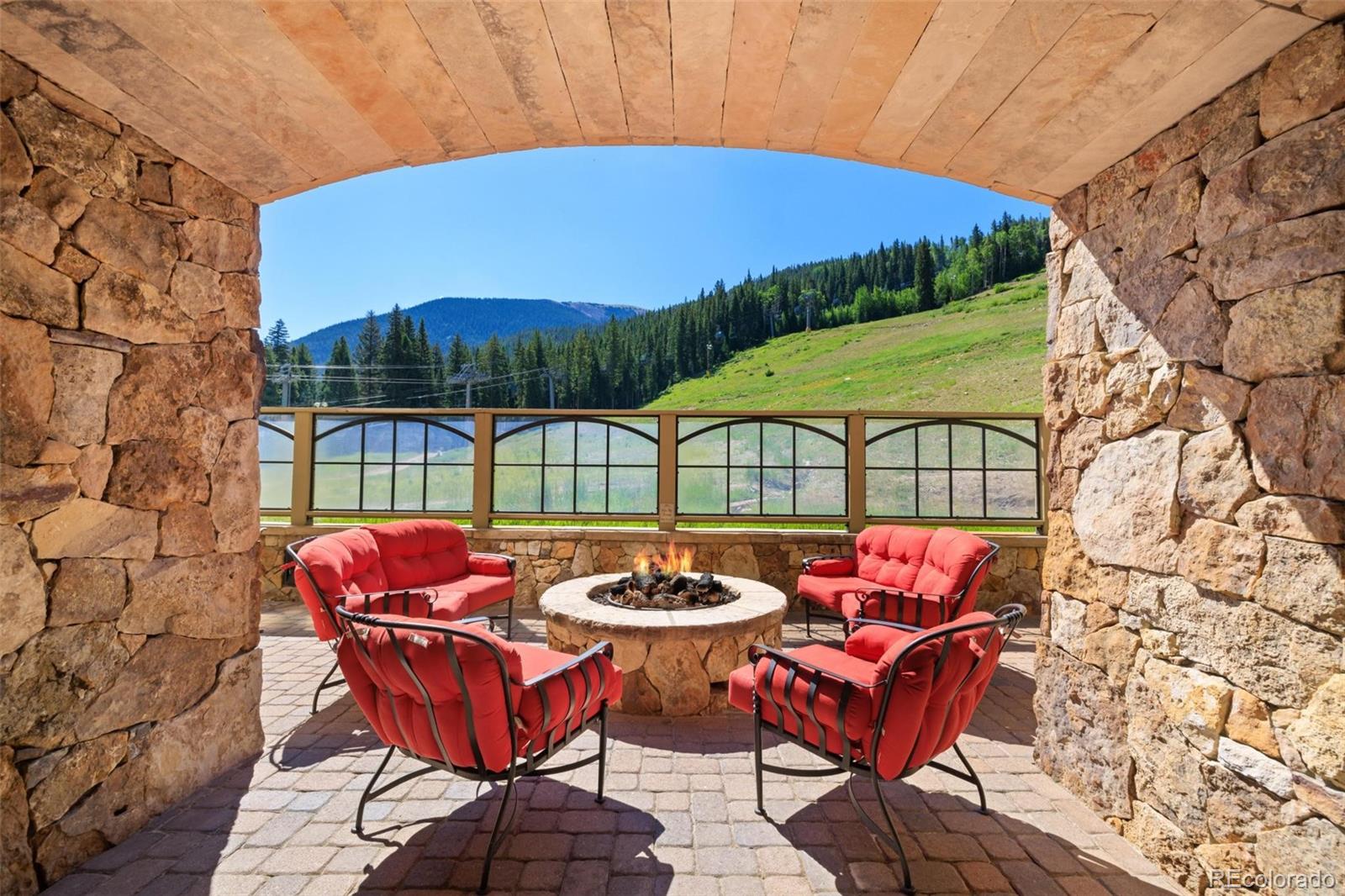 280 Trailhead Drive, Unit 3003 Dillon, CO 80435 - Photo 17 of 27 a outdoor sitting area with chairs and table in it
