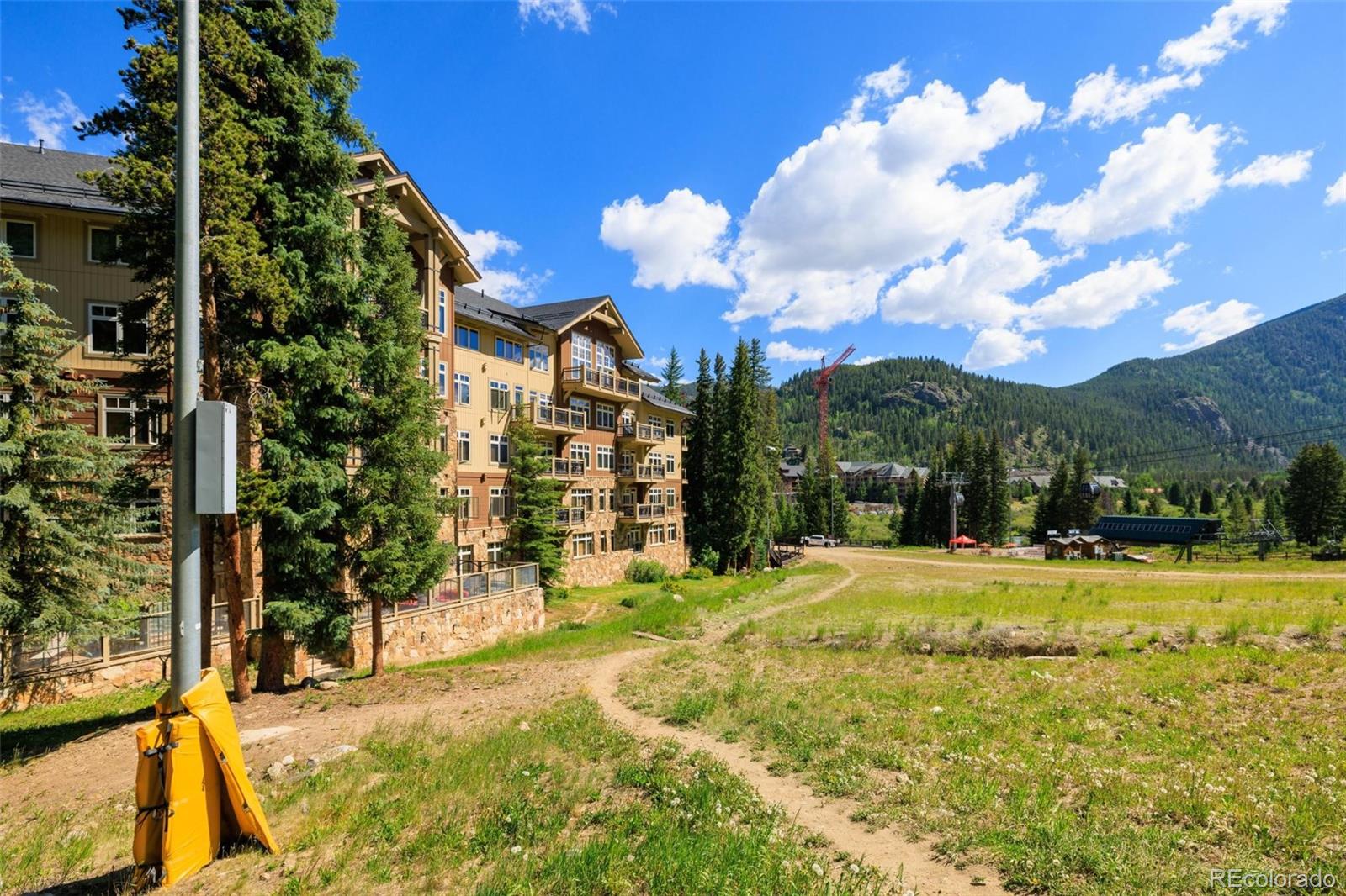 280 Trailhead Drive, Unit 3003 Dillon, CO 80435 - Photo 19 of 27 a view of a house with a yard