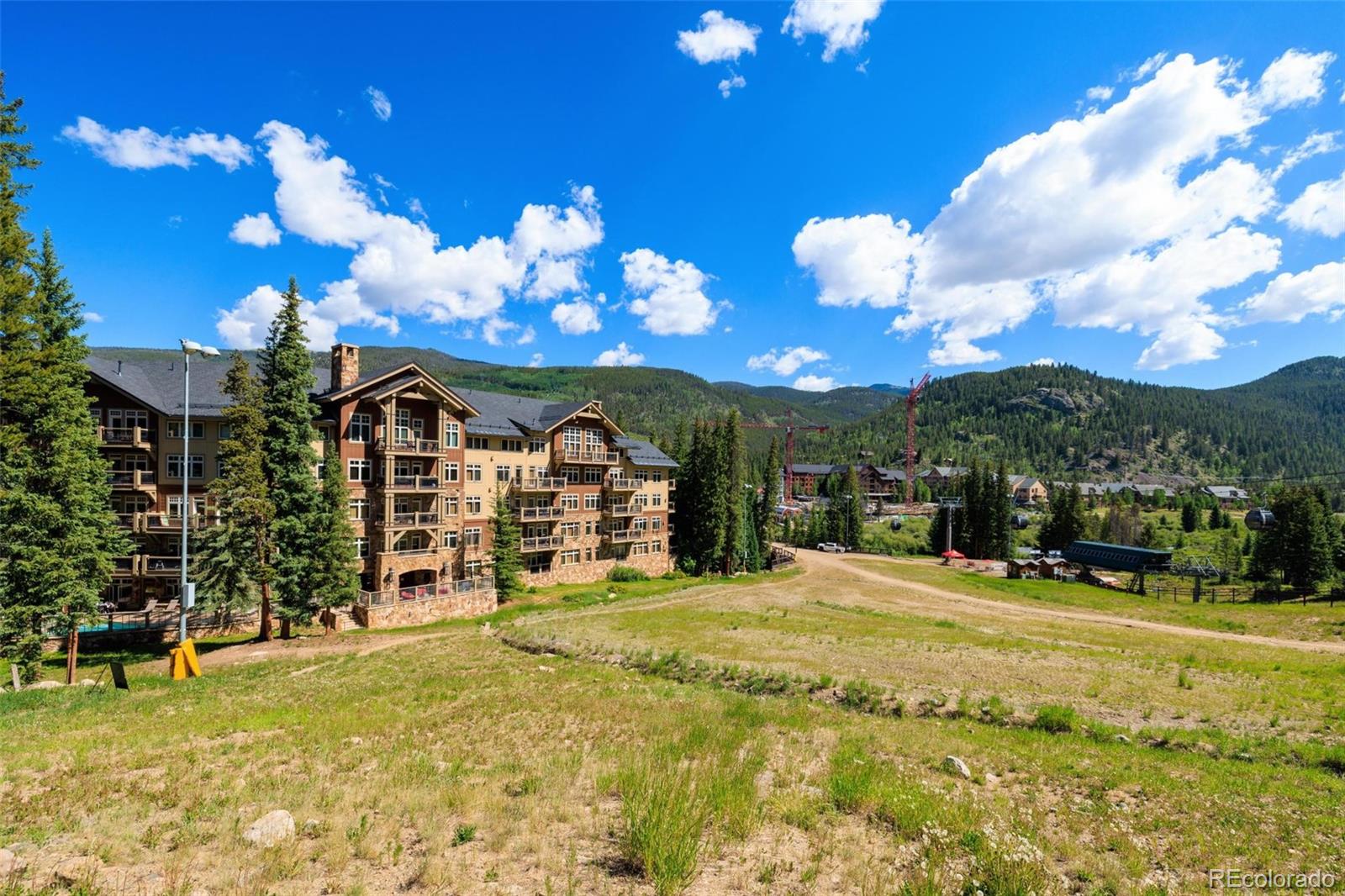 280 Trailhead Drive, Unit 3003 Dillon, CO 80435 - Photo 20 of 27 a view of a house with a yard