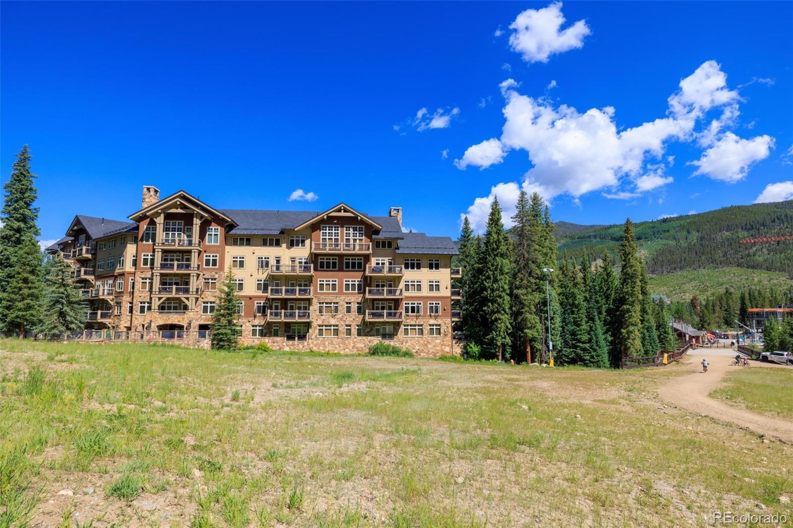 280 Trailhead Drive, Unit 3003 Dillon, CO 80435 - Photo 21 of 27 a view of a house with a yard