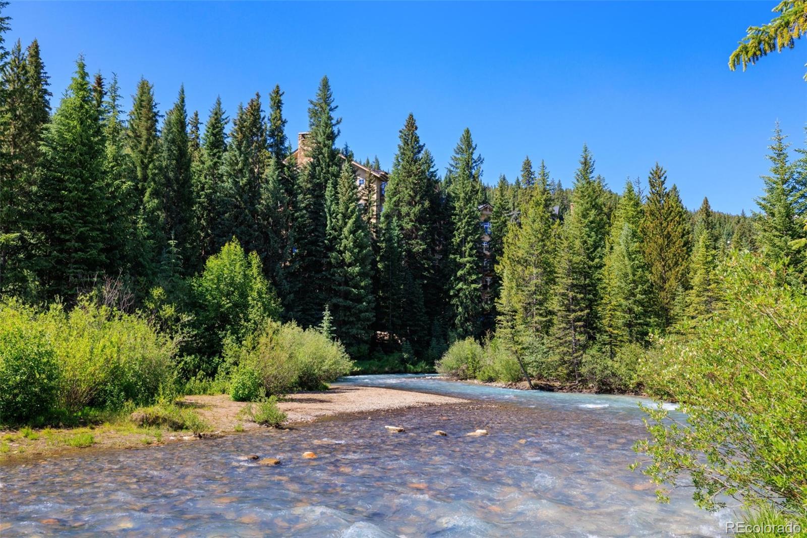 280 Trailhead Drive, Unit 3003 Dillon, CO 80435 - Photo 22 of 27 a view of a pathway with a trees in the background