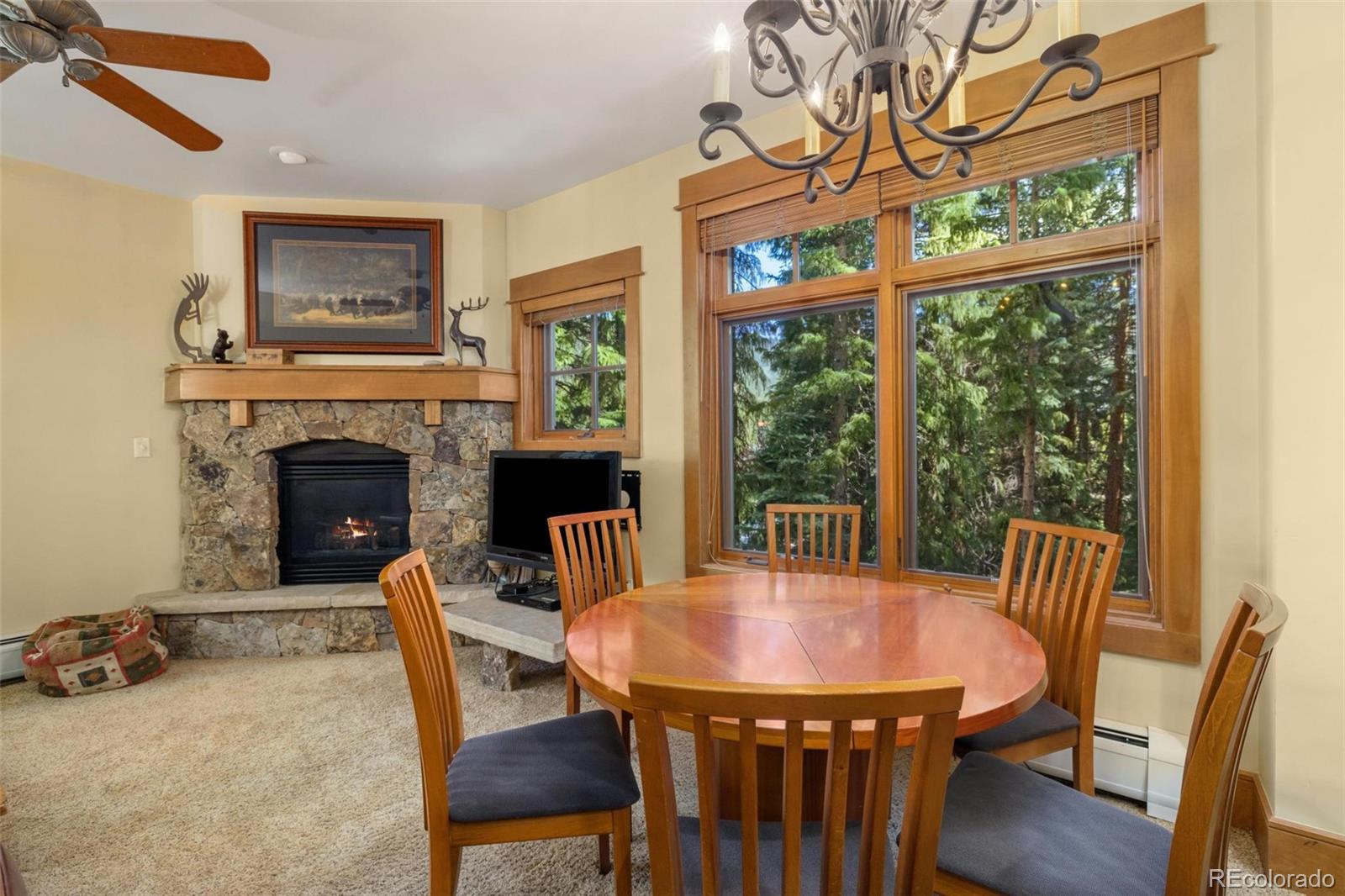 280 Trailhead Drive, Unit 3003 Dillon, CO 80435 - Photo 6 of 27 a view of a dining room with furniture window and outside view