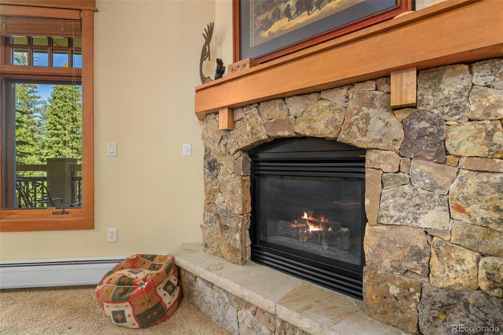 280 Trailhead Drive, Unit 3003 Dillon, CO 80435 - Photo 8 of 27 a room with a fireplace in it