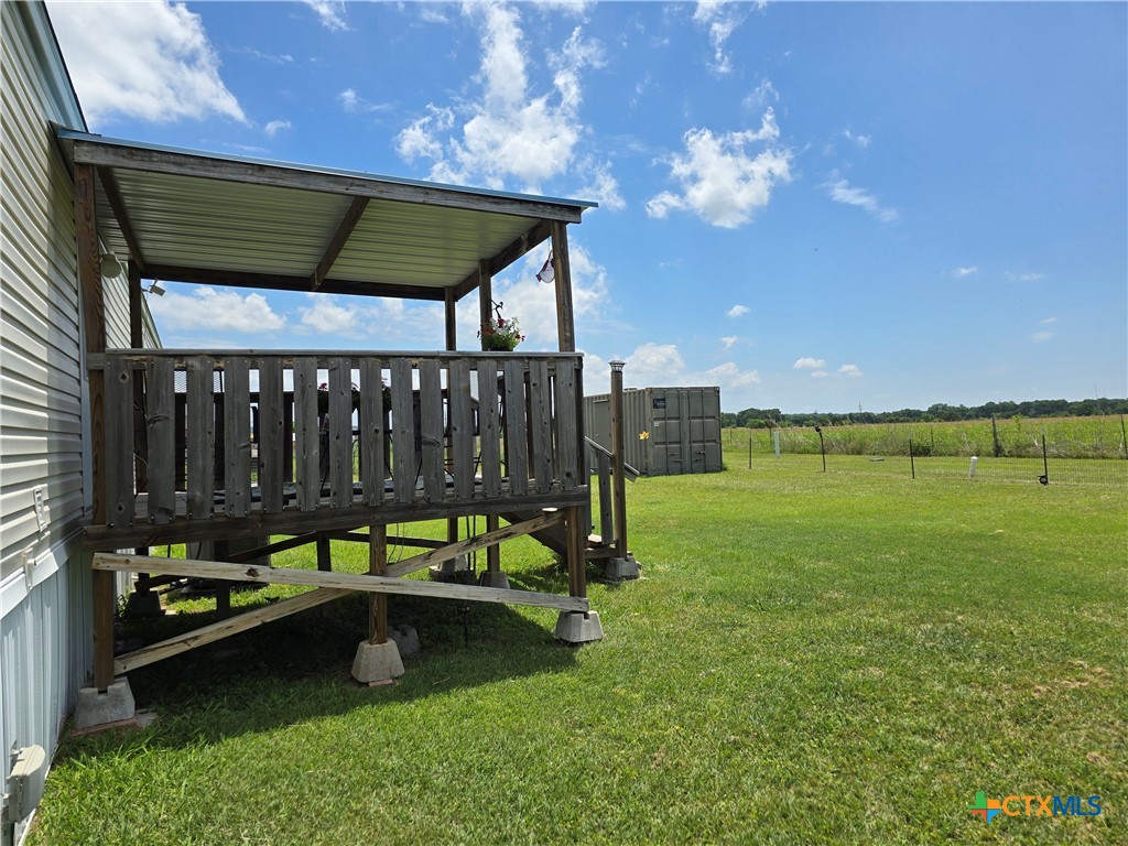 412 Coryell City Road Gatesville, TX 76528 - Photo 32 of 34 a swimming pool with outdoor seating and yard