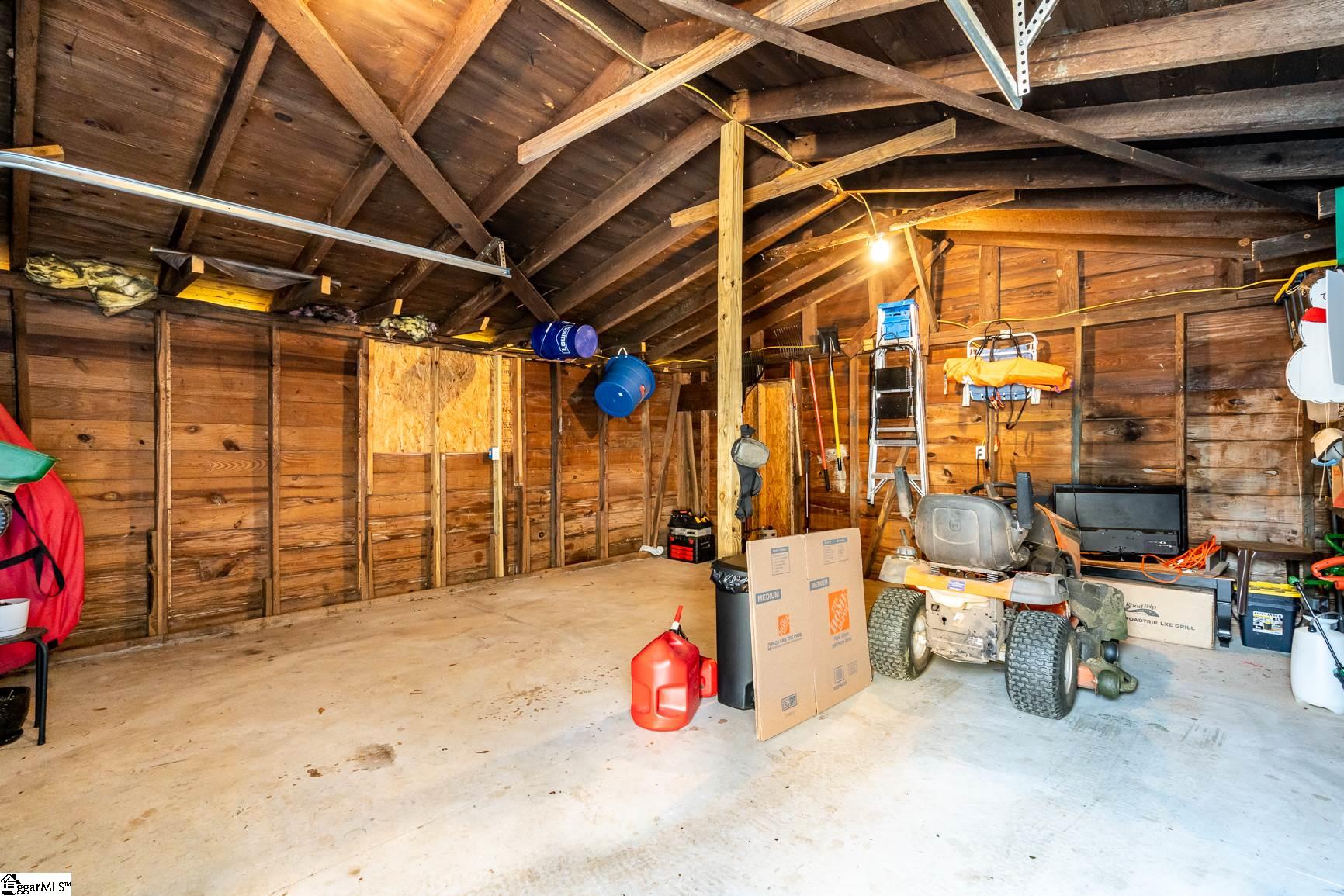 428 McAlister Road Williamston, SC 29697 - Photo 25 of 33 One Car Detached Garage with plenty of Storage