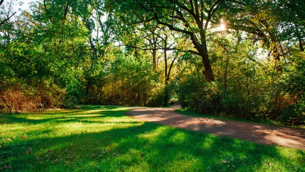 a view of a lake with houses in the back