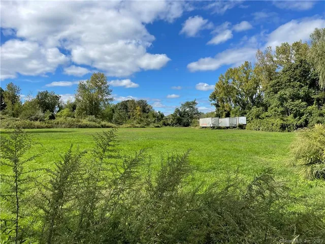 a view of a golf course with a garden