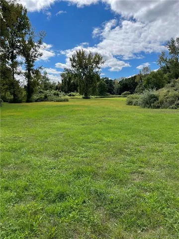 a view of a water from a yard