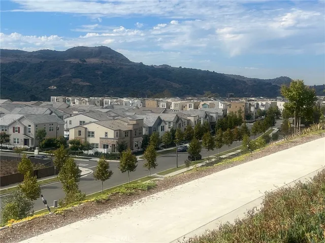 a bathroom with a sink toilet and a mirror