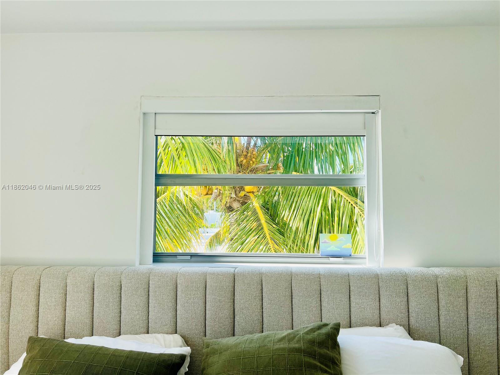 240 Collins Avenue, Unit 4A Miami Beach, FL 33139 - Photo 11 of 16 a bathroom with a sink and a toilet