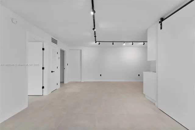 a view of a room with an empty space