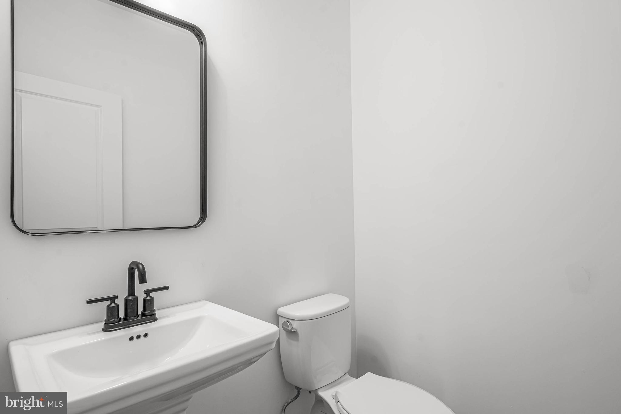 302 Atlantic Street Milton, DE 19968 - Photo 11 of 27 1st Floor Powder Room