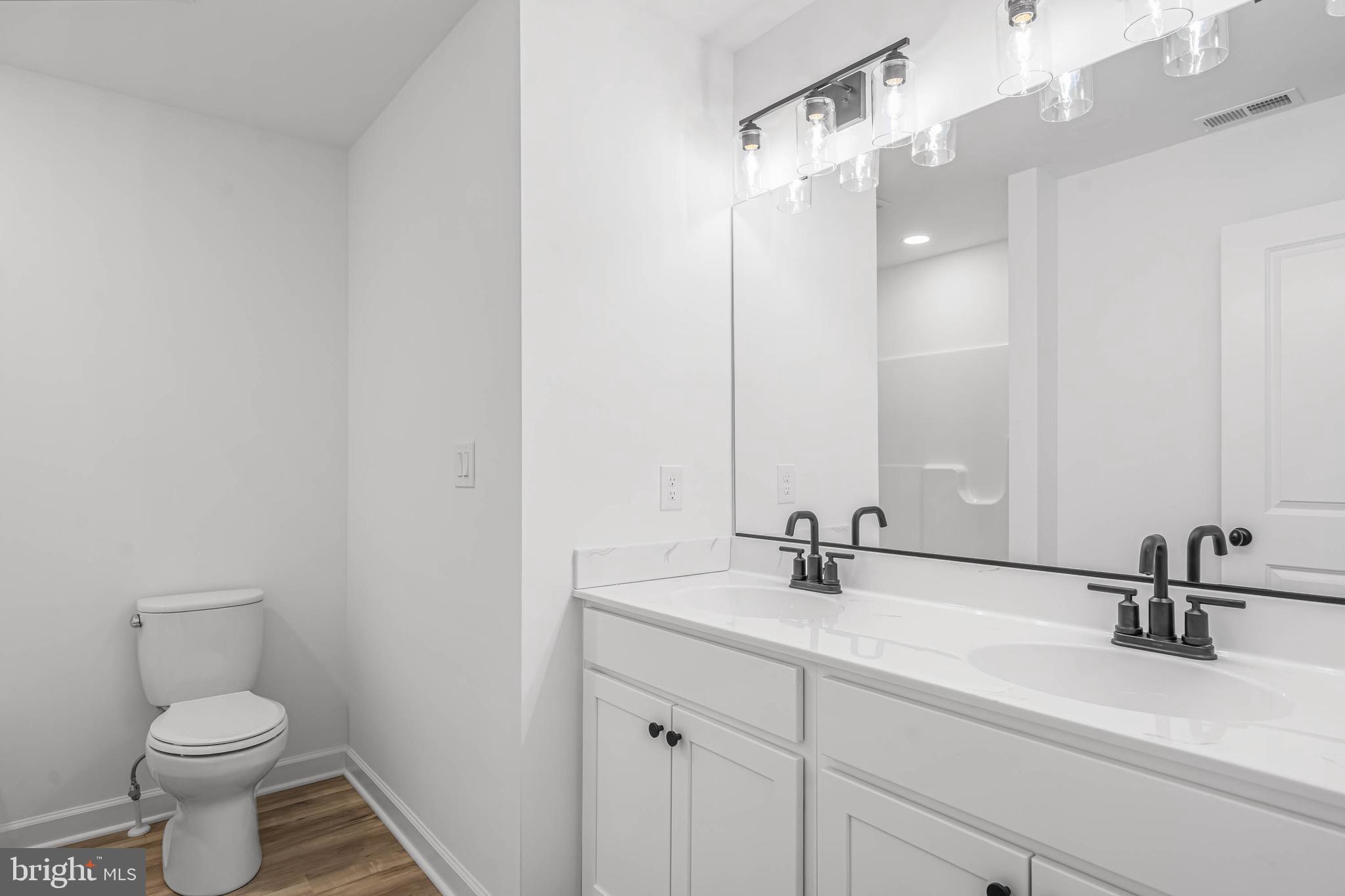 302 Atlantic Street Milton, DE 19968 - Photo 24 of 27 2nd Floor Hall Bath