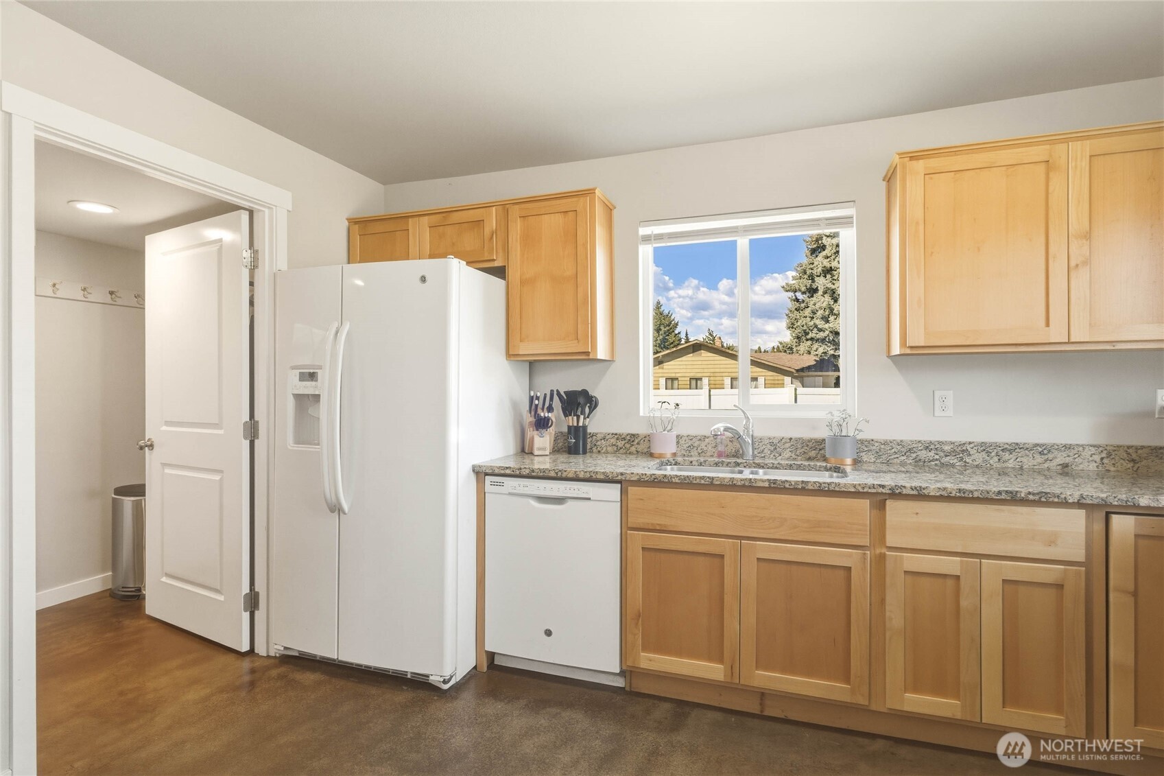 25 Sun Valley Drive Wenatchee, WA 98801 - Photo 9 of 27 a kitchen with white cabinets and window