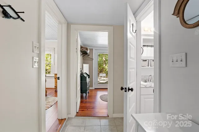 a bathroom with a tub and shower