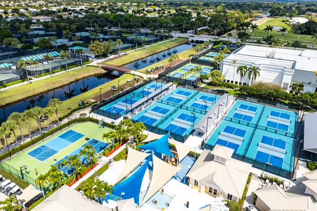 a view of an apartment with a swimming pool